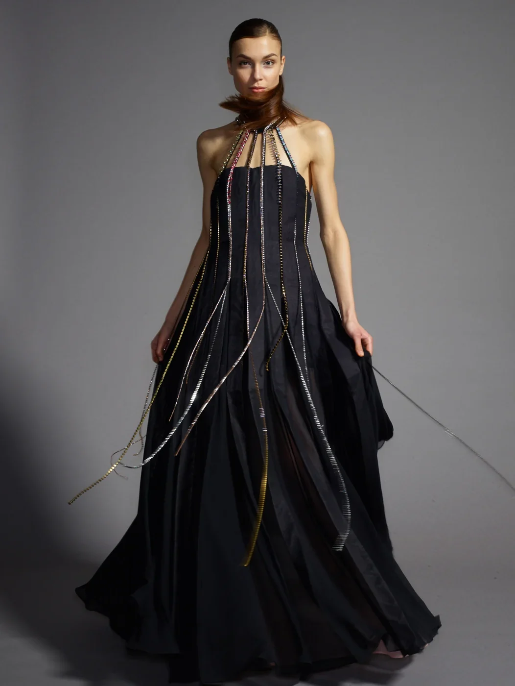 The black MFA Dress illuminated with fine lines